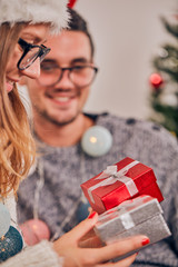 Happy couple enjoying New Year's / Christmas eve.