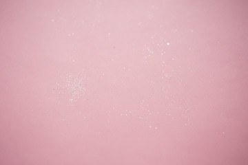 Christmas abstract background glitter diamond. Bokeh pink tinsel