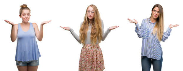Collage of group of blonde women over isolated background clueless and confused expression with arms and hands raised. Doubt concept.