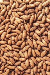 Almond nuts background, vertical image