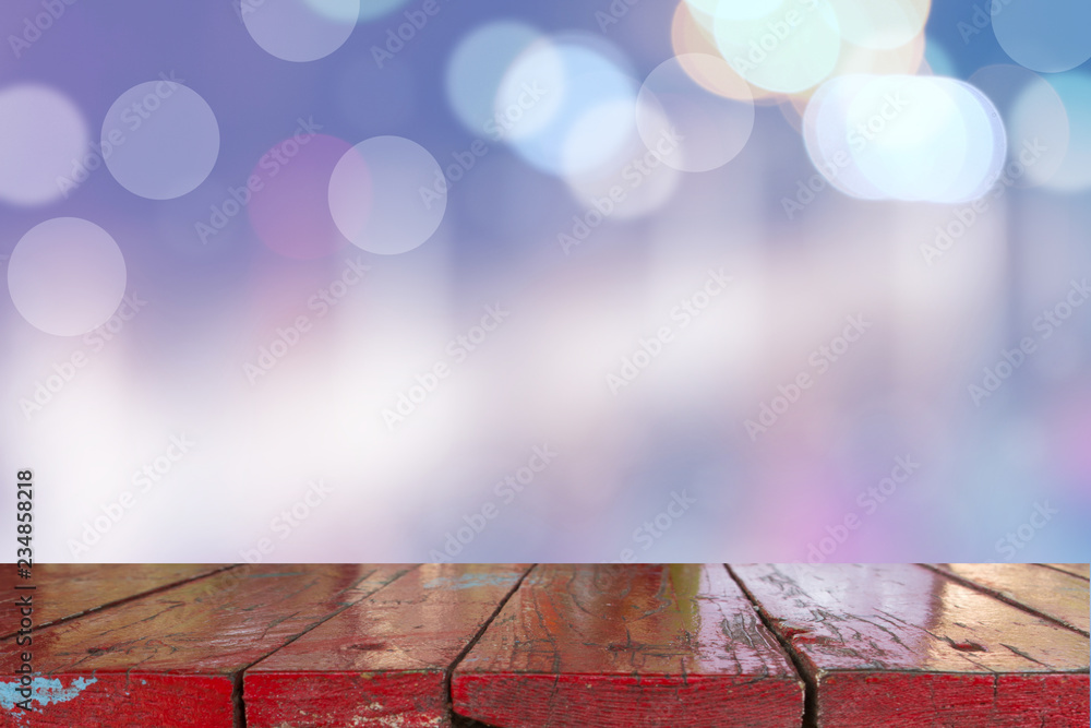 Canvas Prints wooden desk with blurred light bokeh abstract background