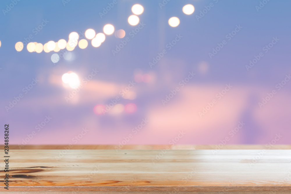 Canvas Prints wooden desk with blurred light bokeh abstract background