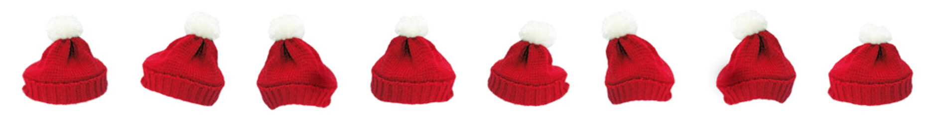 Viele gestrickte Weihnachtsmützen, Nikolausmützen mit Bommel, freigestellt