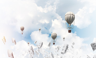 Flying hot air balloons in the air.