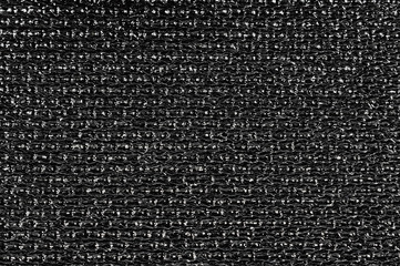 Woven faux fabric, black with highlights.