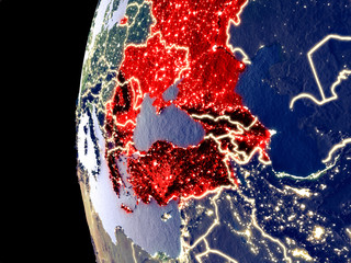 Night view of BSEC countries from space with visible city lights. Very detailed plastic planet surface.