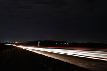 car trails in night