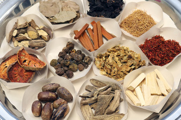 Dried Herbs in paper tray for sacrificial offering or alternative medicine asian thai traditional therapy.