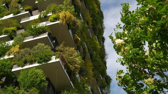 milan city sunny day famous downtown living buildings up view 4k italy
