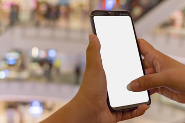 woman holding modern smartphone with withe screen for replacement with blur background