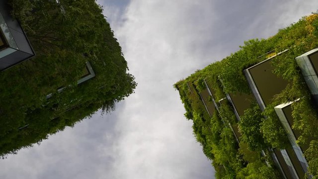 milan city sunny day famous downtown living buildings slow motion up view 4k italy
