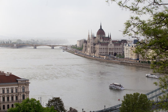 Fog in Budapest . Parliament and  Danube  river.