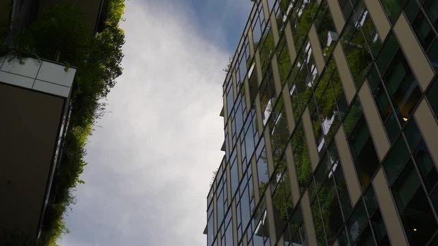 milan city sunny day famous downtown living buildings slow motion up view 4k italy
