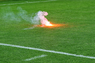 Smoke flare on soccer field