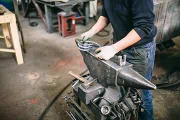  blacksmith working with metal