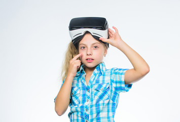 Digital future and innovation. Happy kid use modern technology. Little girl wearing virtual reality goggles. Little child in VR headset. Small child wear wireless VR glasses. New reality is here