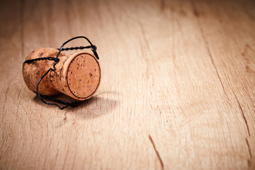 Champagne cork with text on cap