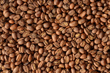 Roasted brown coffee beans pattern, background, top view
