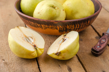 Quince on a dark background.