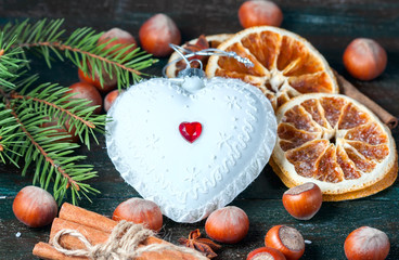 White Christmas tree toy in the form of heart.