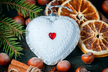 White Christmas tree toy in the form of heart.