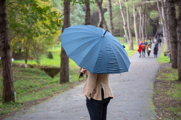 man with umbrella in the park
