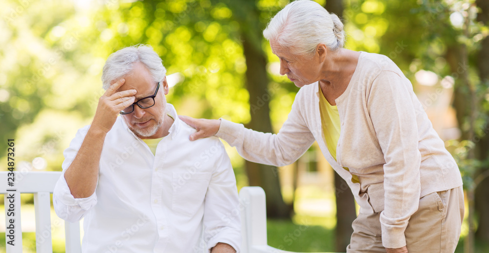 Poster health, stress, old age and people concept - senior man suffering from headache outdoors