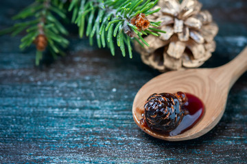 Fototapeta na wymiar Home-made Jam from pine cones, for improving immunity.