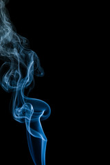 Obraz premium Blue smoke on black background
