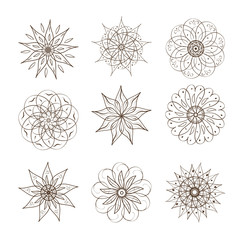 Flowers. Sign, symbol. Template. Semetrichny drawing. Doodle. Plain pattern on a white background. Set.