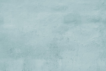 light blue wall background texture pattern with cracked plaster