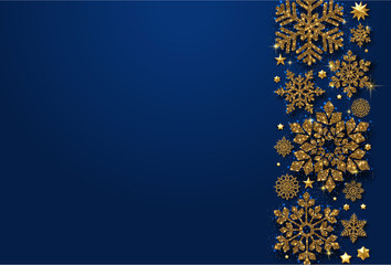 Christmas, New Year or winter background with gold shiny snowflakes.