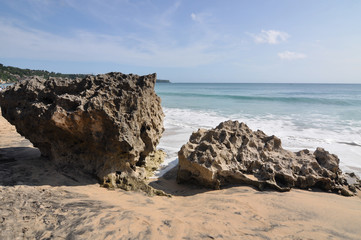Fototapeta na wymiar rocks on the beach at Uluwatu, Bali