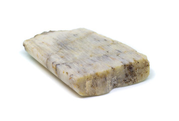 Natural polished belomorite stone on a white background isolated