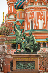 Fototapeta na wymiar Statue of Kuzma Minin and Dmitry Pozharsky in front of St. Basil`s Cathedral.