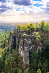 Fototapeta na wymiar Panorama view on the beautiful rock formation of Bastei in Saxon Switzerland National Park, near Dresden and Rathen - Germany. Popular travel destination in Saxony.