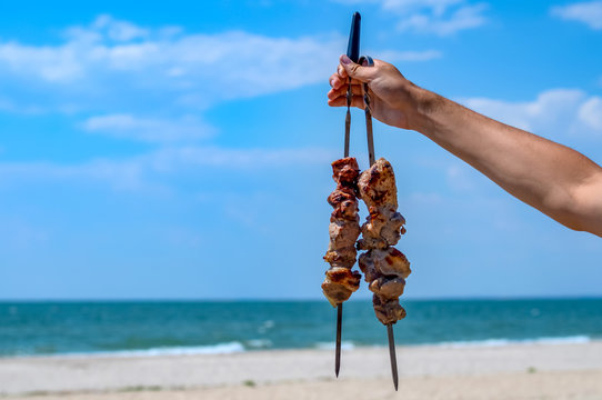 Barbecue on the beach at summer