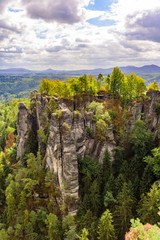 Panorama view on the beautiful rock formation of Bastei in Saxon Switzerland National Park, near Dresden and Rathen - Germany. Popular travel destination in Saxony.