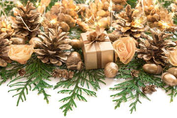 Christmas and New Year border design on the white background with thuja, cones and decorations