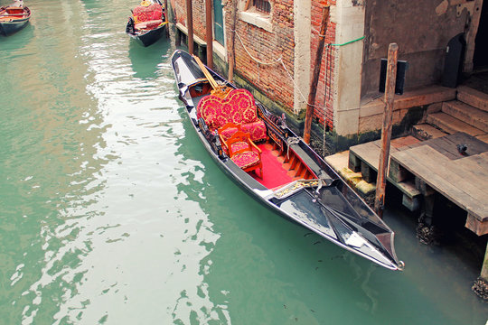 itional view of Venice. Gondola along canal. Venice. Italy