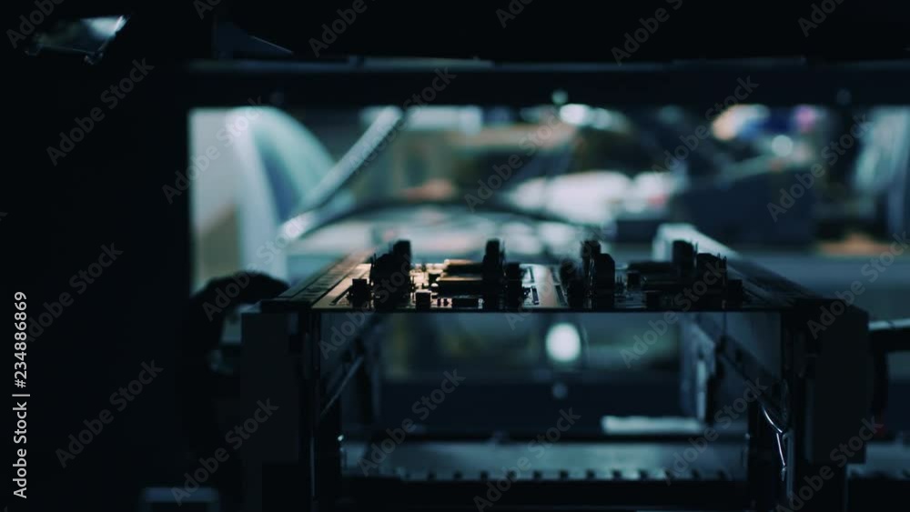 Poster automated robotic industrial equipment is testing electronic printed circuit board with light and la