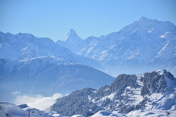 Alpine Panaorama in the winter with snow and Matterhorn