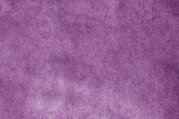 Natural leather surface in purple tone.