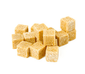 brown sugar cubes isolated on white