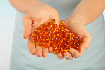 HANDFUL OF VITAMIN OIL CAPSULES