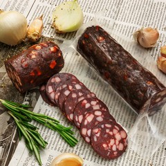 Dried bear, wild boar, deer on a wooden background