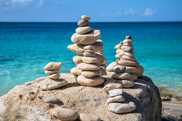 Stacks of stones in balance at a beach
