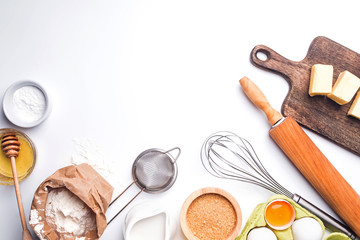 Baking ingredients on the white background, top view