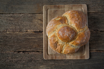 fresh bread on wooden surface