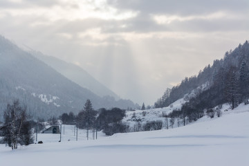 Obraz premium Sunny winter landscape in swiss mountains in the rhone valley